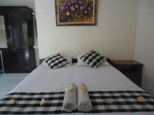 Postel nebo postele na pokoji v ubytování Nataliya Homestay