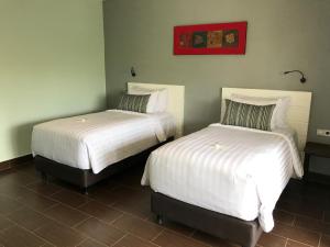 Postel nebo postele na pokoji v ubytování Borobudurhills