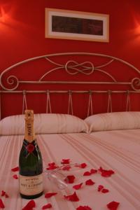 Posteľ alebo postele v izbe v ubytovaní Hotel Restaurante Casa Julia