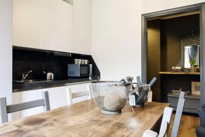 Kjøkken eller kjøkkenkrok på Suite11 Como apartment