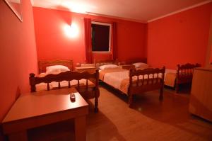Voodi või voodid majutusasutuse Hotel 24 jul toas