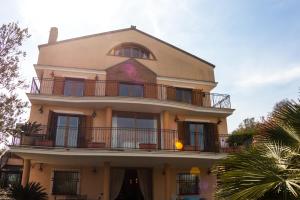 a building with a balcony on top of it at Relaxing Life Resort in Spoltore