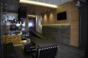 TV a/nebo společenská místnost v ubytování Hotel Zefyros