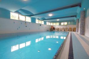 Bazén v ubytovaní Apartament Krokus SPA alebo v jeho blízkosti