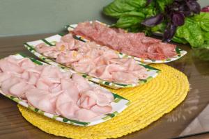 three plates of food sitting on a table at Relais Regina Giovanna in Sorrento