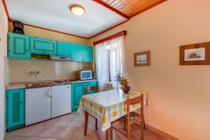 Kuchyň nebo kuchyňský kout v ubytování Apartments Josip & Maria