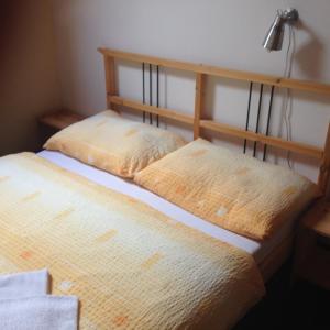 Postel nebo postele na pokoji v ubytování Apartments Monika