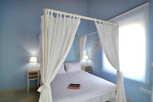 Postel nebo postele na pokoji v ubytování Villa Despina in Kisamos