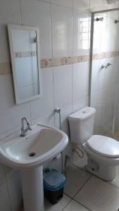 Een badkamer bij Pousada Anhanguera
