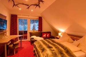 Voodi või voodid majutusasutuse Hotel & Restaurant Grüner Baum - Die Grüne Oase Am Feldberg toas