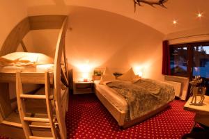 Voodi või voodid majutusasutuse Hotel & Restaurant Grüner Baum - Die Grüne Oase Am Feldberg toas