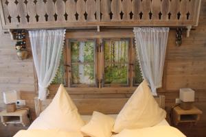 Voodi või voodid majutusasutuse Hotel & Restaurant Grüner Baum - Die Grüne Oase Am Feldberg toas