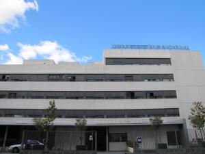 a white building with a sign on top of it at Eco Via Lusitana in Madrid
