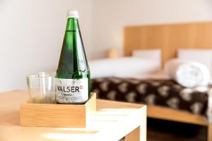 Postel nebo postele na pokoji v ubytování Hotel Alpina