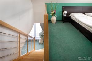 Postel nebo postele na pokoji v ubytování Garni HOTEL Fellini