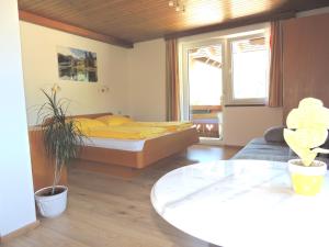 Ein Bett oder Betten in einem Zimmer der Unterkunft Haus Bergfried