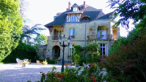 Zahrada ubytování Chambres d'Hôtes-Château Constant