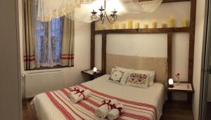 Posteľ alebo postele v izbe v ubytovaní Suites 13 Budapest