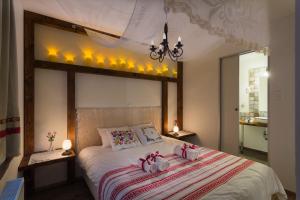 Posteľ alebo postele v izbe v ubytovaní Suites 13 Budapest
