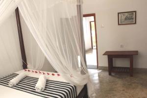 Cama o camas de una habitación en Pedlar 62 Guest House