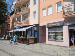 Hostia v ubytovaní Apartament z balkonem przy Latarni 150m od morza