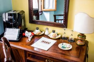 Příslušenství pro přípravu čaje a kávy v ubytování Hotel Il Bargellino