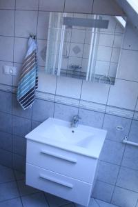 Kúpeľňa v ubytovaní Beach house + 18 fotografií