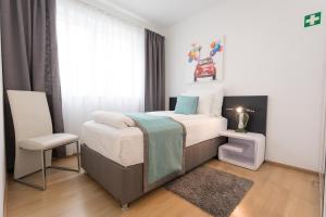 Łóżko lub łóżka w pokoju w obiekcie Mar Suite Apartments - Center