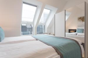 Łóżko lub łóżka w pokoju w obiekcie Mar Suite Apartments - Center
