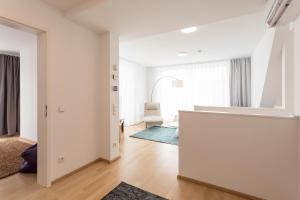 Łóżko lub łóżka w pokoju w obiekcie Mar Suite Apartments - Center