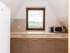 Kuchyň nebo kuchyňský kout v ubytování Pokoje Gościnne Bachledzki Wierch