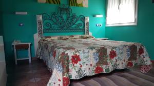 Hosteria Las Viñas tesisinde bir odada yatak veya yataklar