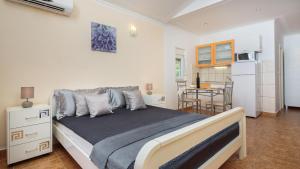 Postel nebo postele na pokoji v ubytování Apartment Krželj