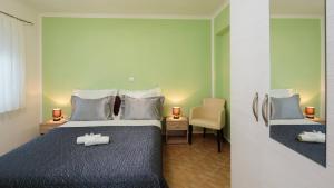 Postel nebo postele na pokoji v ubytování Apartment Krželj