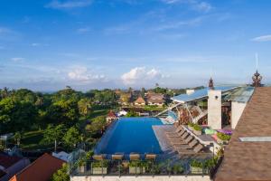 A view of the pool at Artotel Sanur - Bali or nearby