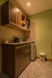 A kitchen or kitchenette at Apart Guillaumet