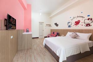 Postel nebo postele na pokoji v ubytování Sanwu Homestay