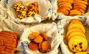 a bunch of different types of cookies and pastries at Margarita Hotel in Kythira