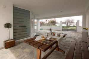 Posedenie v ubytovaní Coastal Apartments Volos Alykes