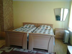 Postel nebo postele na pokoji v ubytování Jaani 2-1 Apartment