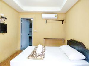 Postel nebo postele na pokoji v ubytování Tuk Tuk Guesthouse
