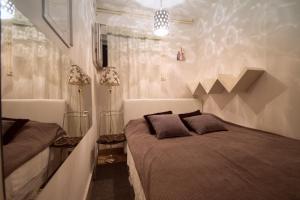 Katil atau katil-katil dalam bilik di Apartmani SEA VIEW