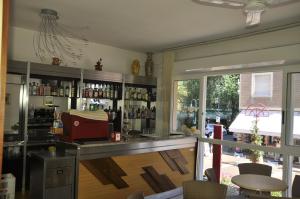 Nápoje v ubytování Albergo Larenzia + 24 fotografií