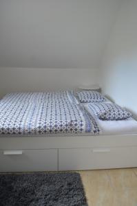 Postel nebo postele na pokoji v ubytování Apartman Smolnicka Huta 211
