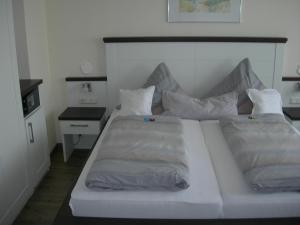 Postel nebo postele na pokoji v ubytování Apart Hotel Norden