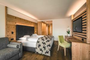 Posteľ alebo postele v izbe v ubytovaní Dolasilla Mountain Panoramic Wellness Hotel