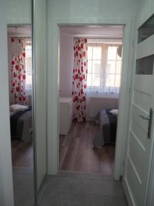 Kúpeľňa v ubytovaní Apartament RED FLOWERS