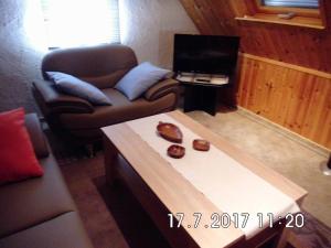Ein Sitzbereich in der Unterkunft Ferienappartement Obrigheim