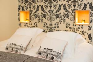 Postel nebo postele na pokoji v ubytování Maison Amodio Boutique B&B adults only