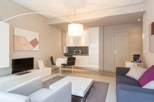 TV a/nebo společenská místnost v ubytování Four Stars Aparthotel